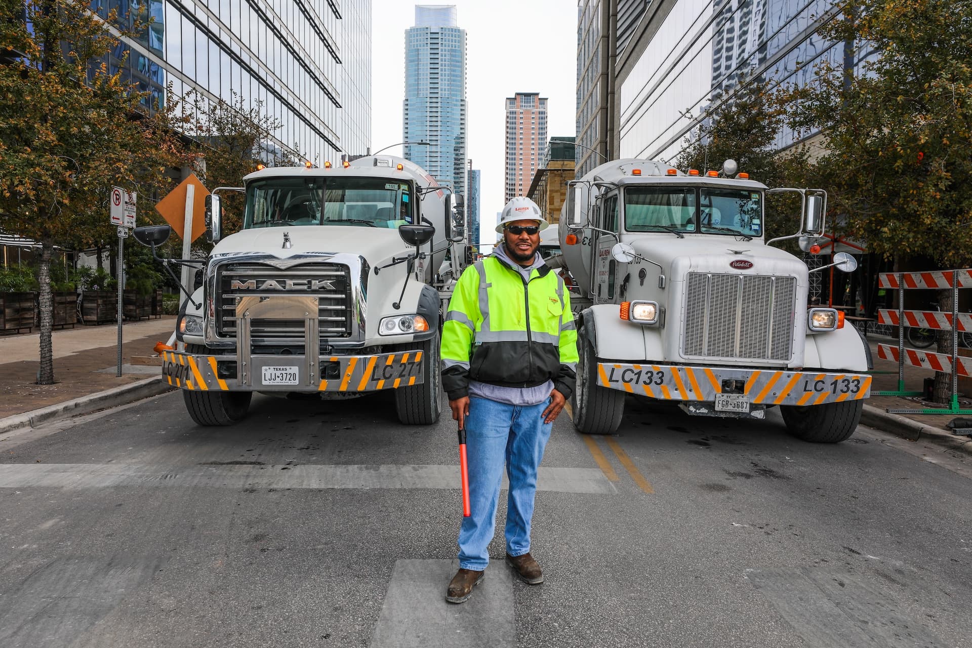 Quality technician helping in the field on a downtown Austin job