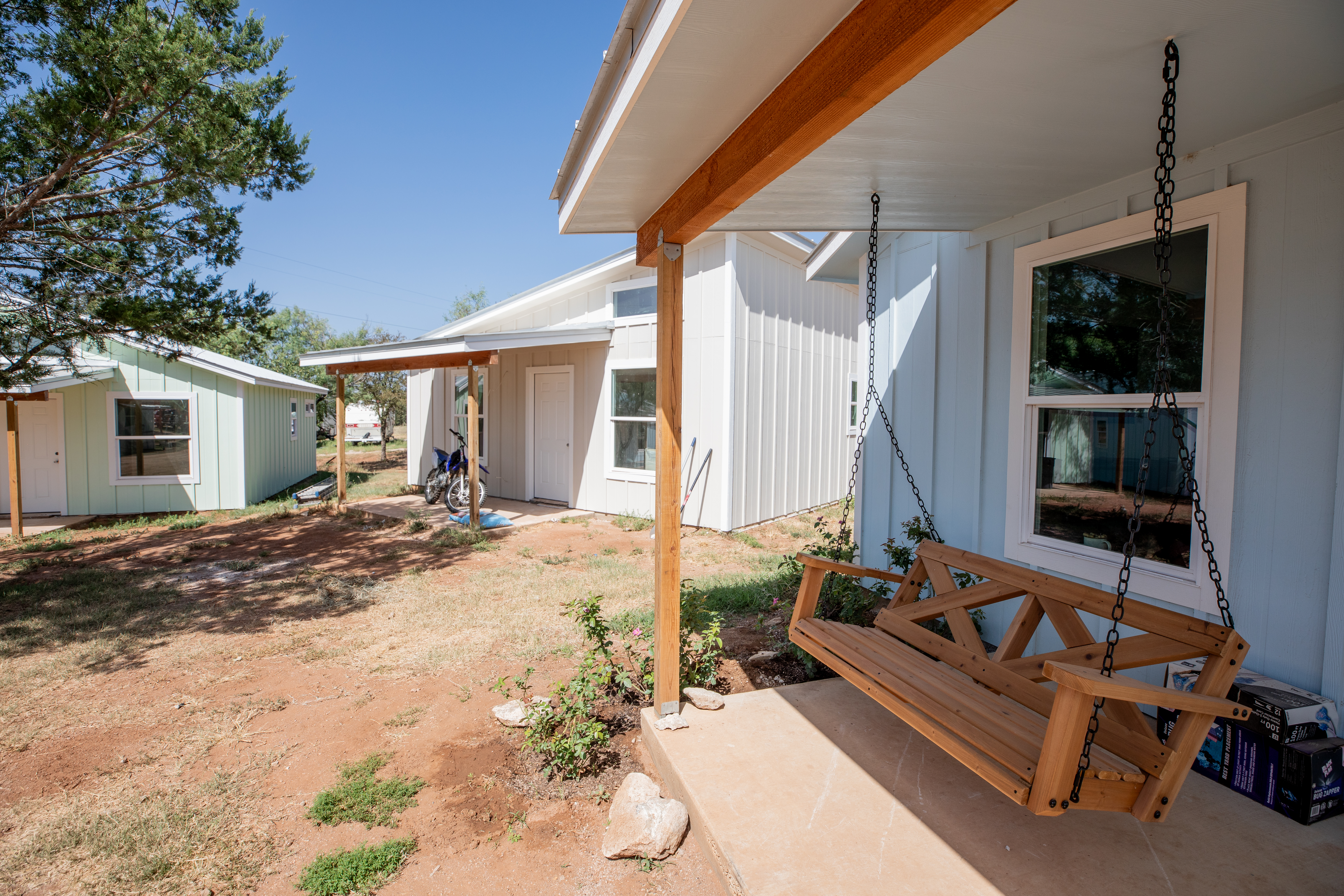 Porch swing at a house pod at Valley View Village