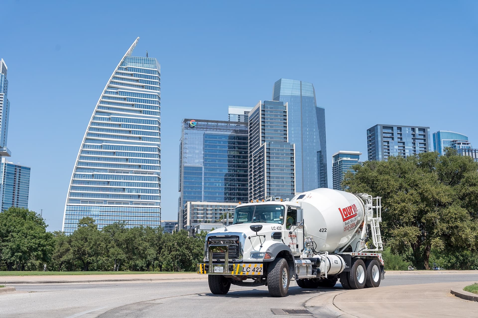 A Lauren Concrete ready-mix truck in downtown Austin, Texas in front of the Block 185 building